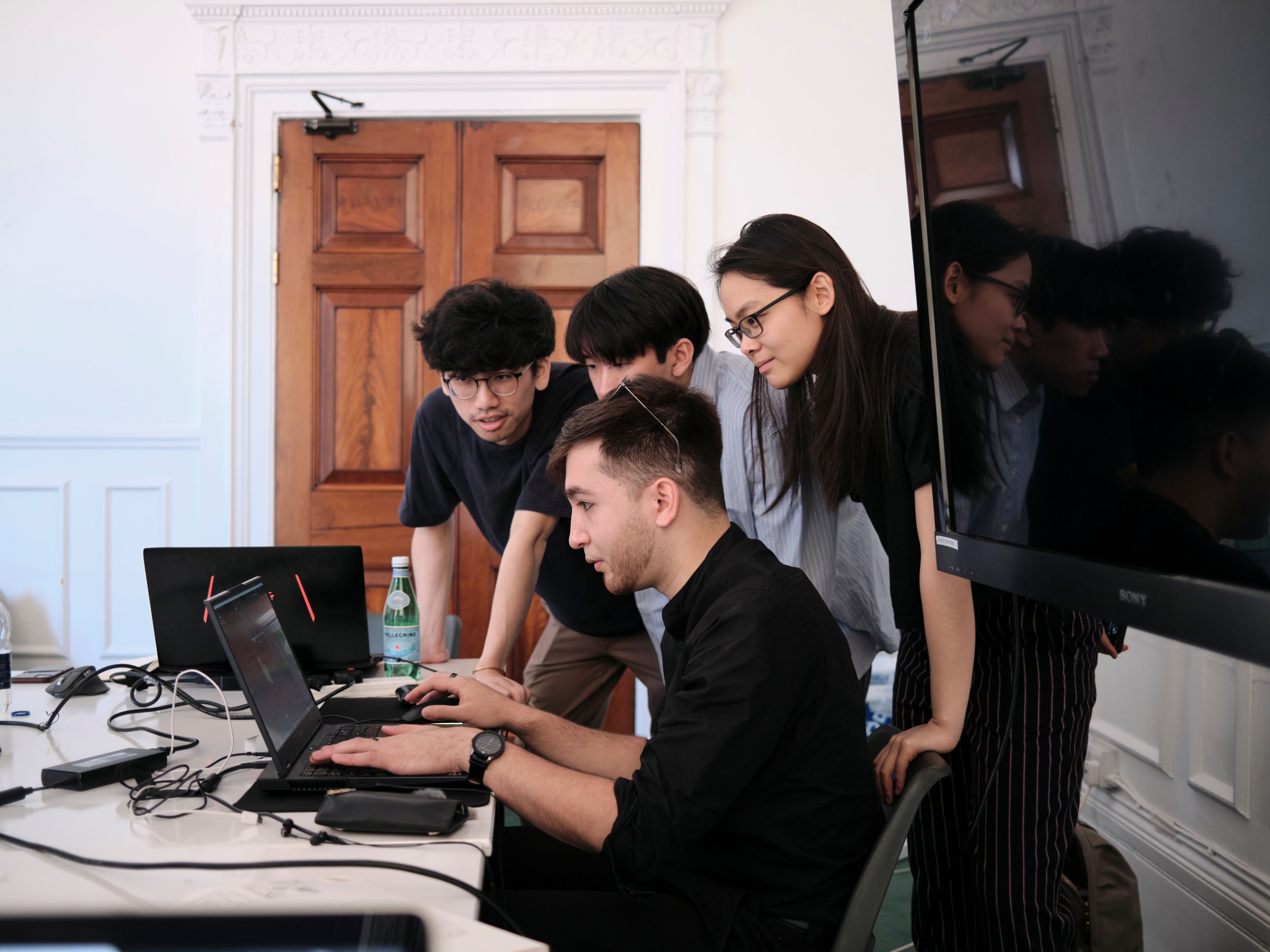 Students working in an AA computer lab