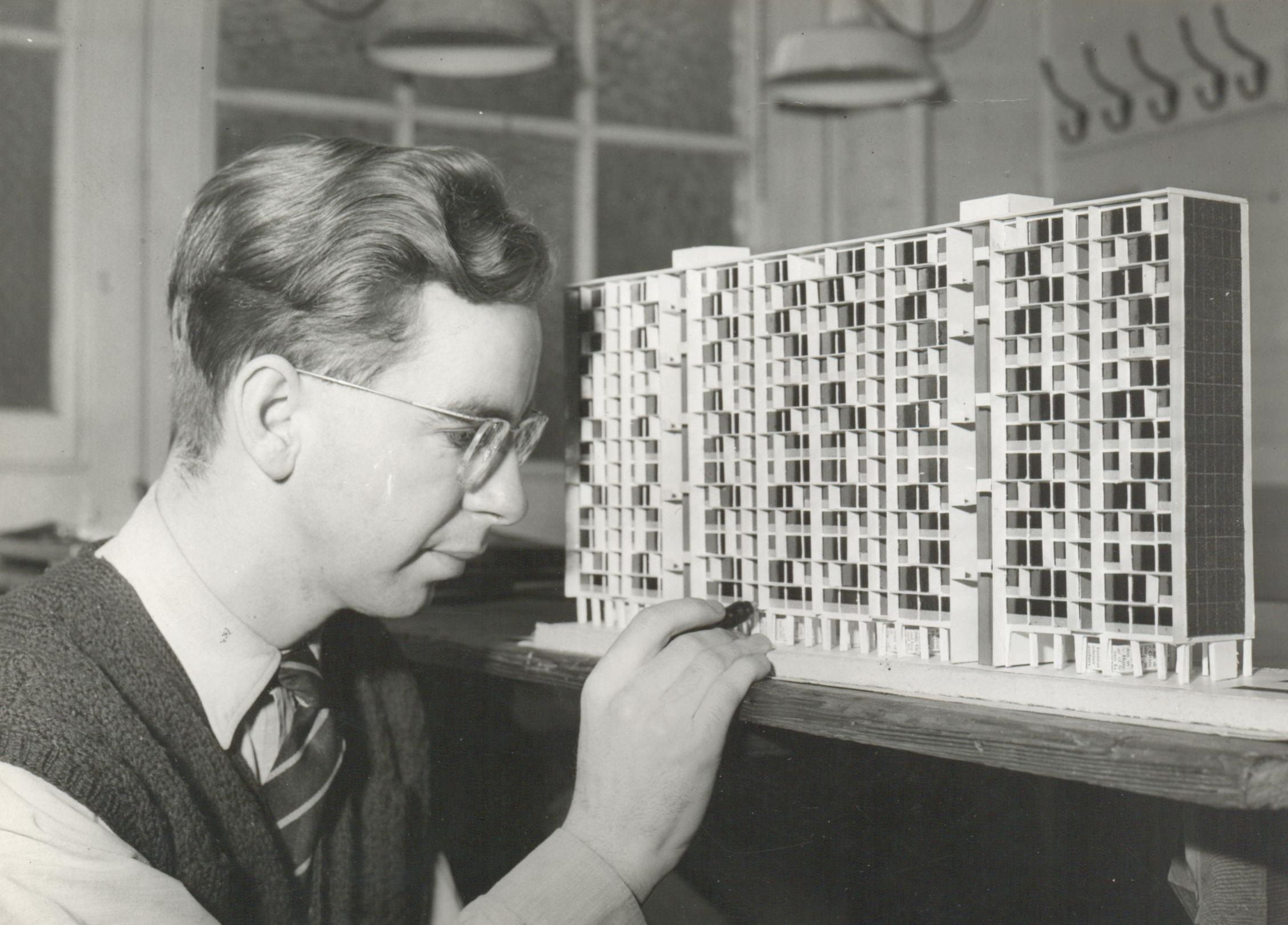 William Gillitt, at the AA with unidentified architectural model, c 1954. AA Archives