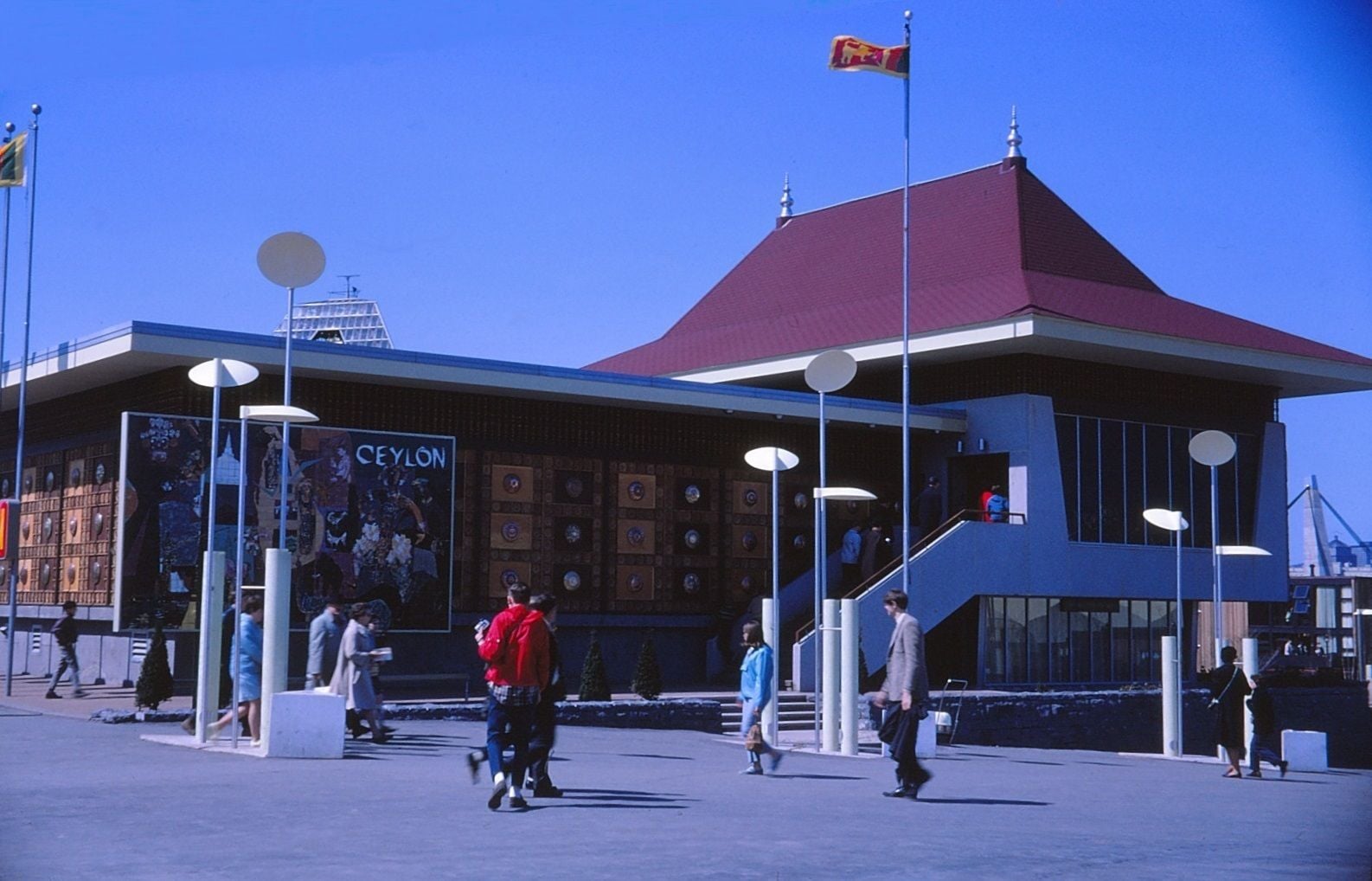 The Ceylon Pavilion at an exhibition, featuring a traditional roof and visible 'CEYLON' sign.
