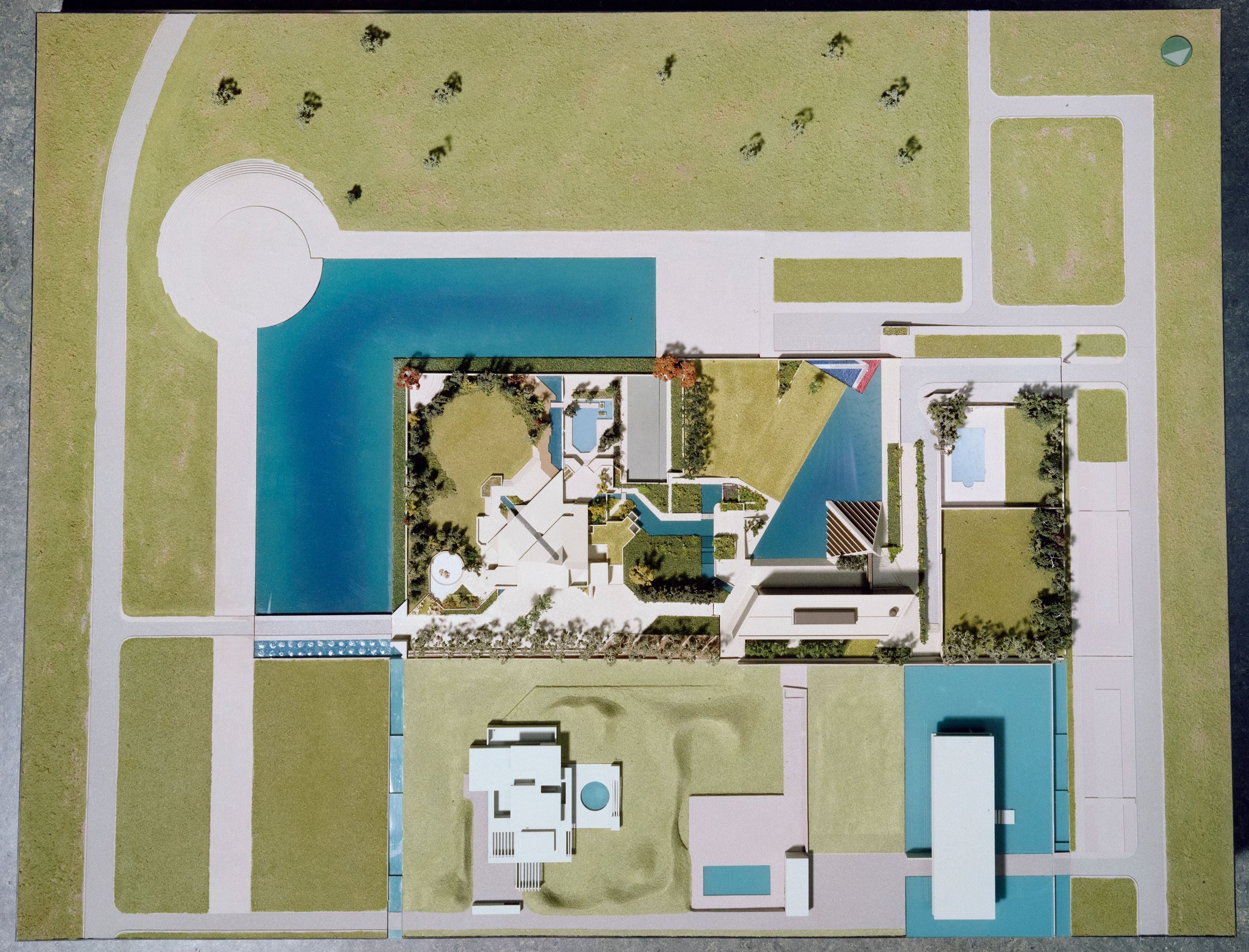 Overhead view of an intricate architectural model depicting a modern residential complex.