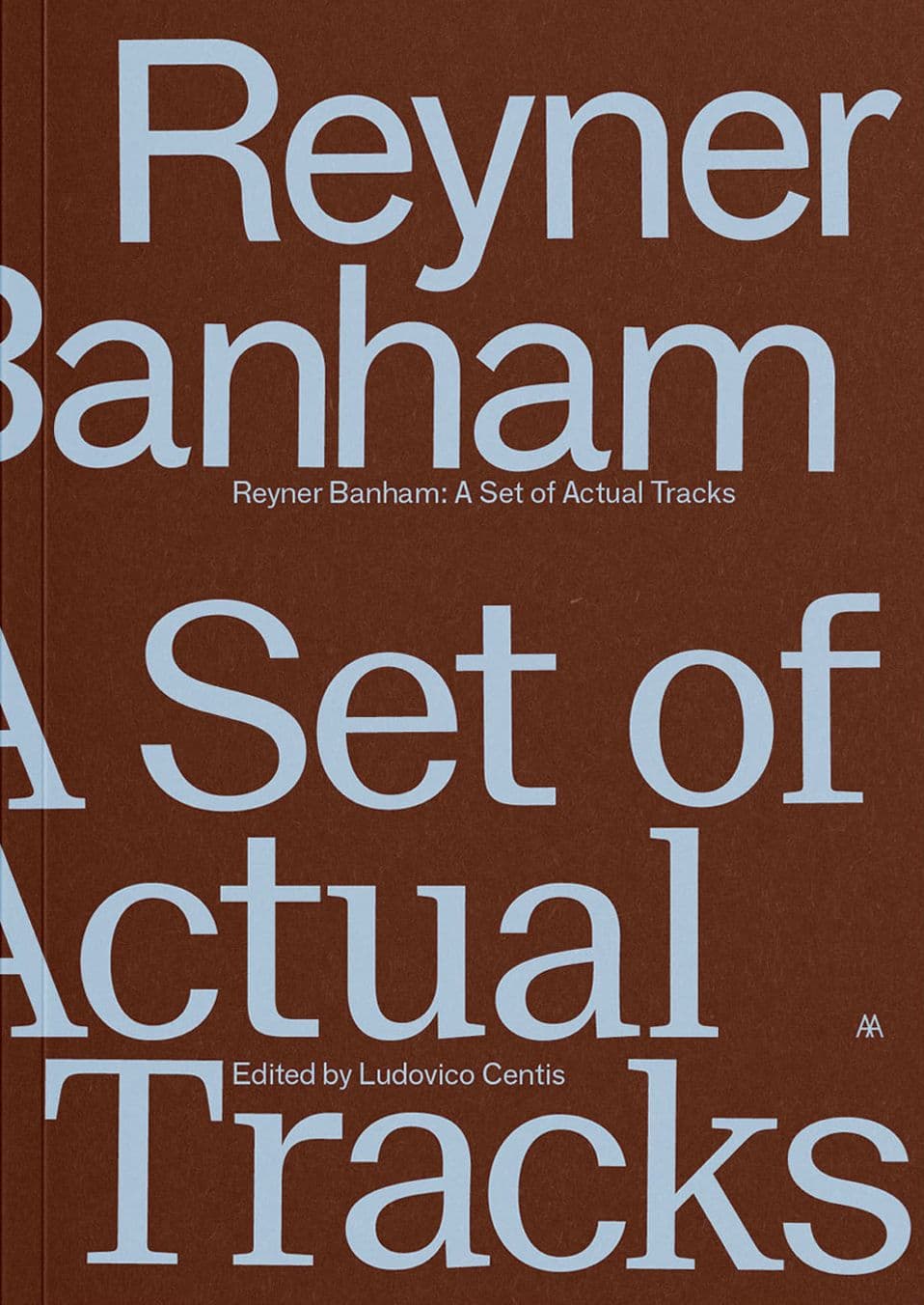 Book cover titled 'Reyner Banham: A Set of Actual Tracks' on a brown background.